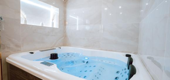 Loft avec jacuzzi privatif et salle de massage
